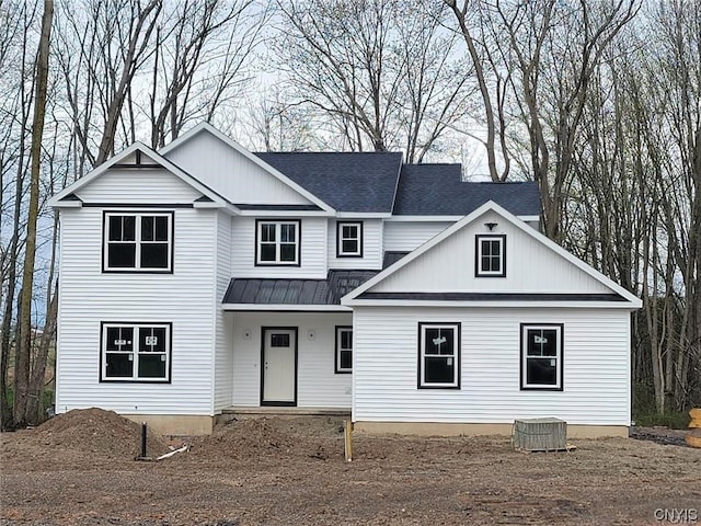 view of front of property with central air condition unit