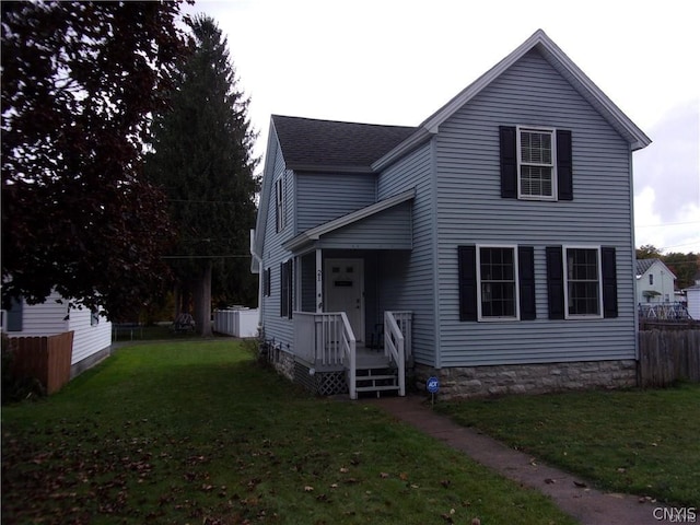 view of front facade featuring a front yard