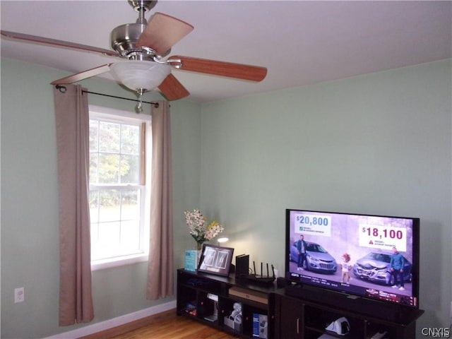 interior space with ceiling fan and light hardwood / wood-style floors