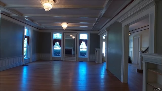 entrance foyer with coffered ceiling, ornamental molding, dark wood-type flooring, and beamed ceiling