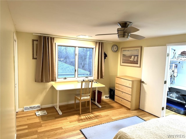 bedroom featuring ceiling fan and light hardwood / wood-style flooring