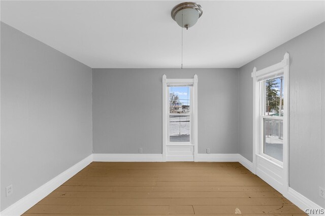 empty room featuring hardwood / wood-style floors