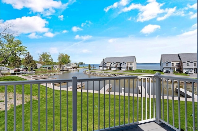 balcony featuring a water view