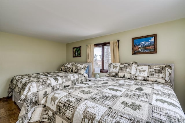 bedroom with parquet floors