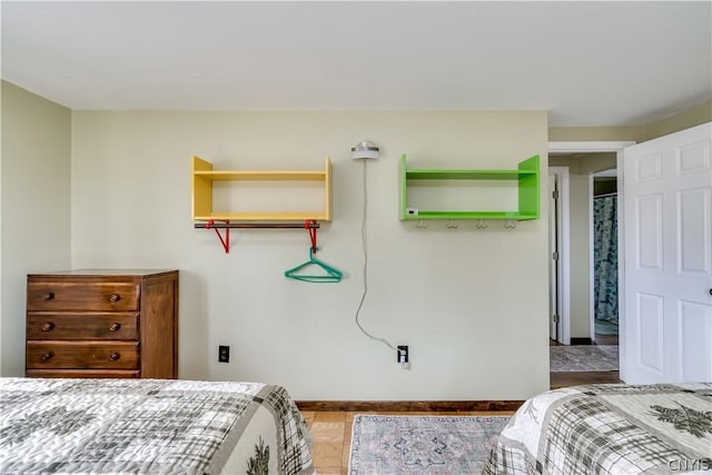 bedroom featuring parquet floors