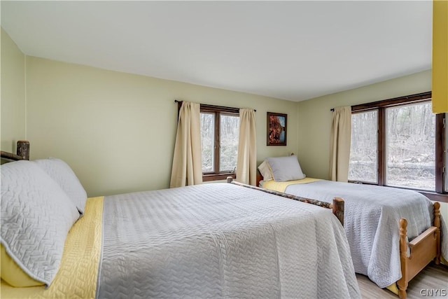 bedroom with light hardwood / wood-style flooring