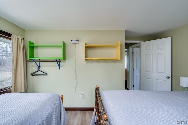 bedroom with light hardwood / wood-style floors