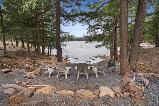 view of patio featuring a water view