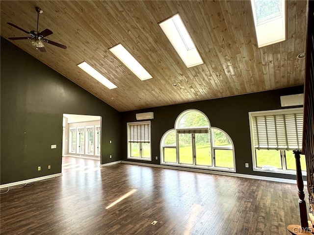 unfurnished living room featuring hardwood / wood-style flooring, a wealth of natural light, and high vaulted ceiling