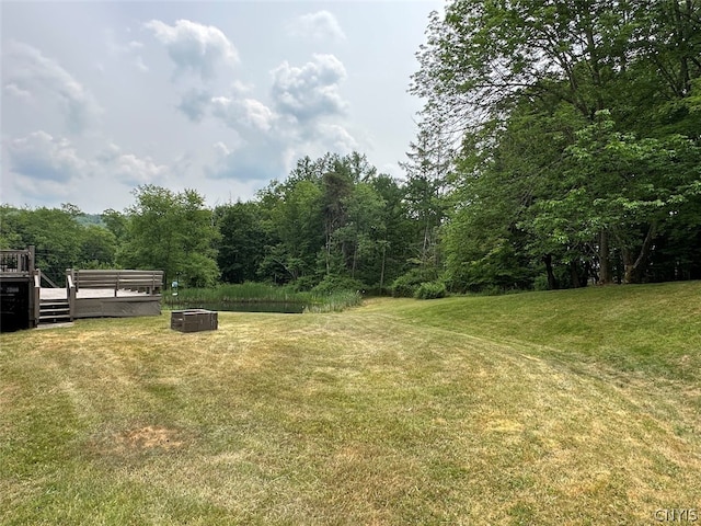 view of yard featuring a deck