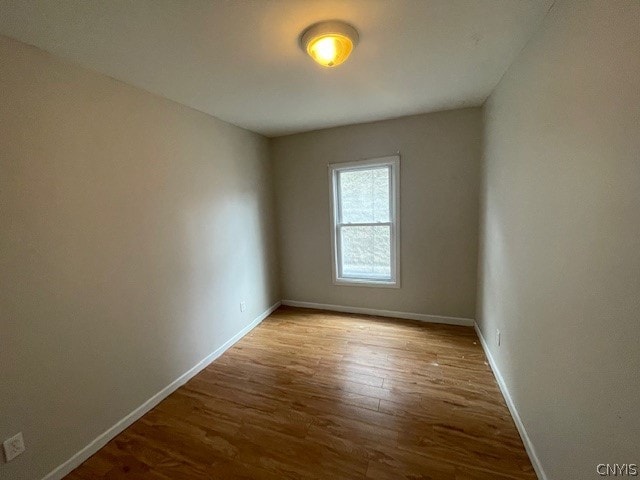 empty room featuring hardwood / wood-style floors