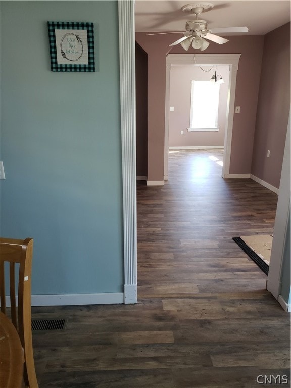 hallway featuring dark hardwood / wood-style floors