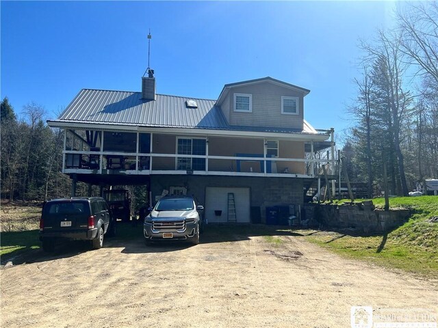 view of front of home featuring a garage