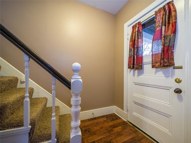 entryway featuring dark wood-type flooring