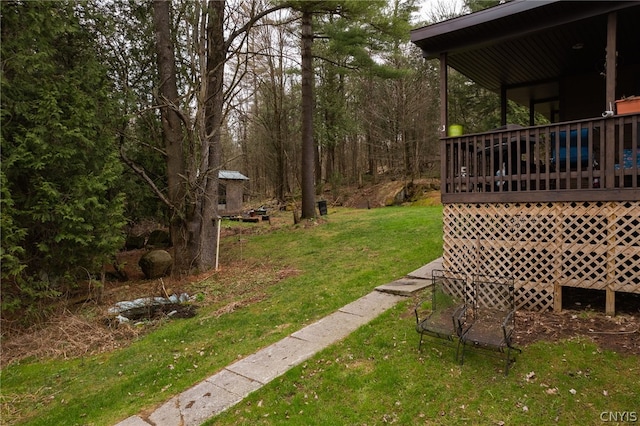 view of yard with a deck