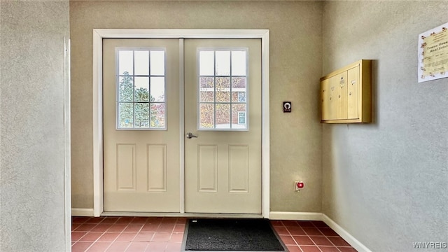 entryway with tile patterned flooring