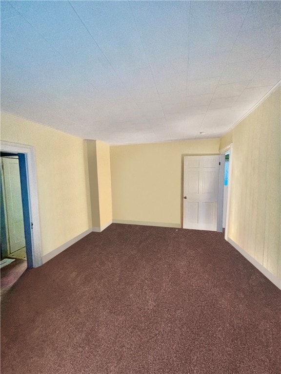 unfurnished room with carpet floors