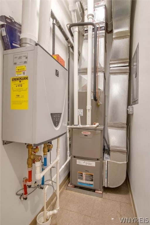 utility room with tankless water heater