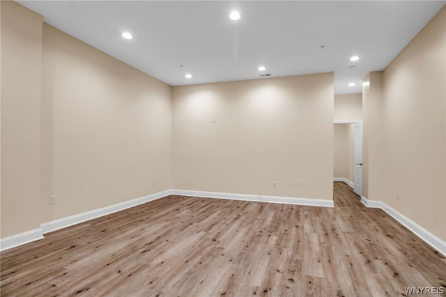 unfurnished room featuring light wood-type flooring