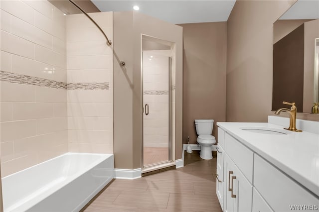 bathroom featuring oversized vanity, toilet, and tile flooring