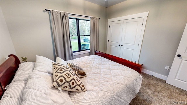 bedroom featuring a closet and carpet flooring