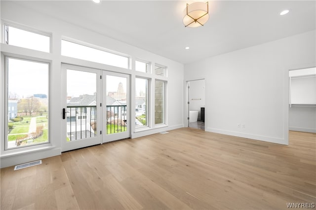 interior space with plenty of natural light and light wood-type flooring