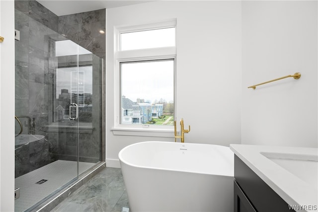 bathroom with a healthy amount of sunlight, vanity, shower with separate bathtub, and tile floors