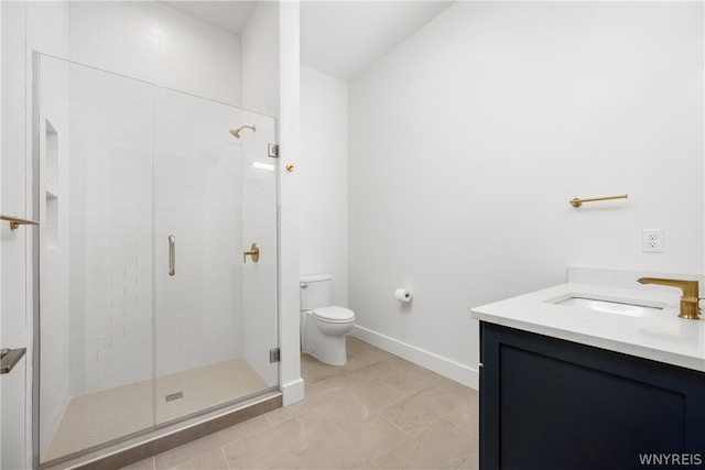 bathroom with tile flooring, walk in shower, vanity, and toilet