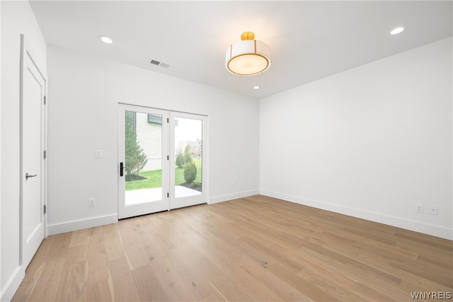 empty room with light wood-type flooring