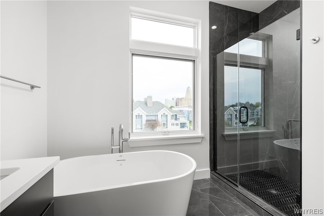 bathroom with tile flooring and plus walk in shower