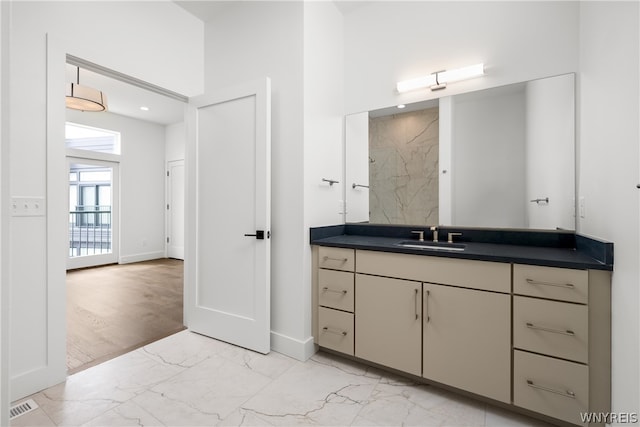 bathroom featuring vanity and hardwood / wood-style floors