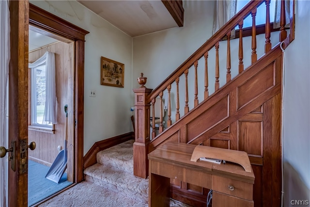 foyer featuring carpet flooring