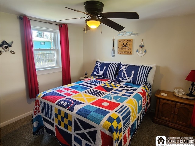 carpeted bedroom featuring ceiling fan