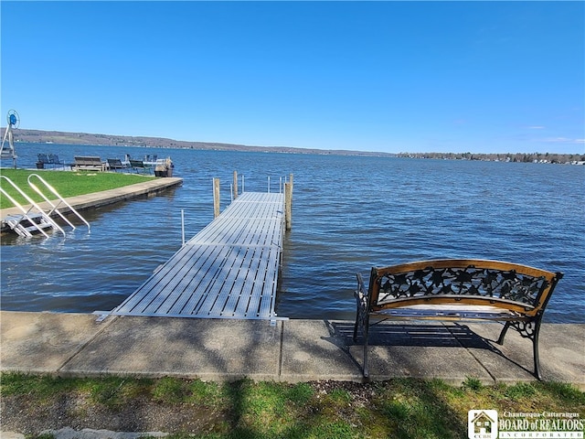 view of dock with a water view