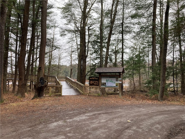 view of front of property featuring a wooden deck