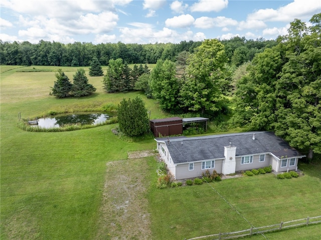 drone / aerial view featuring a water view and a rural view