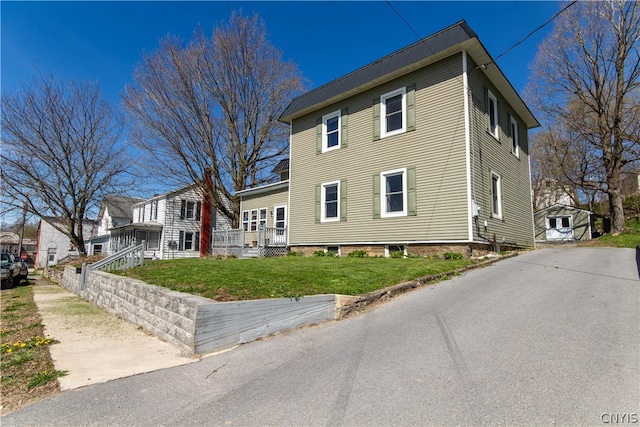 view of front of home with a front yard