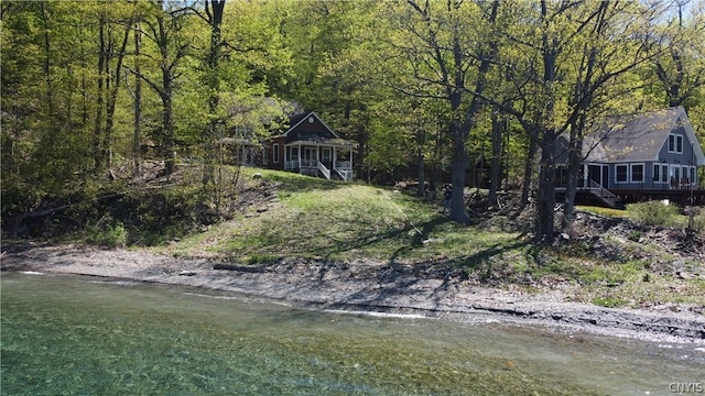 view of yard with a water view