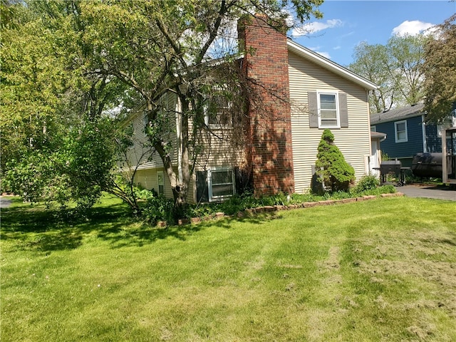 exterior space featuring a lawn