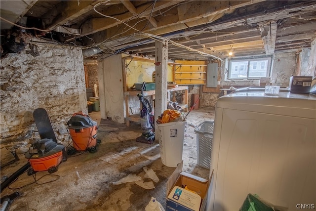 basement with washer and clothes dryer