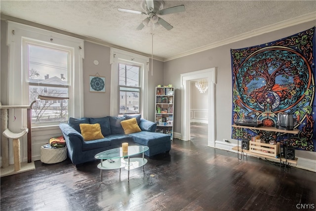 sitting room featuring hardwood / wood-style floors, ceiling fan, and a textured ceiling