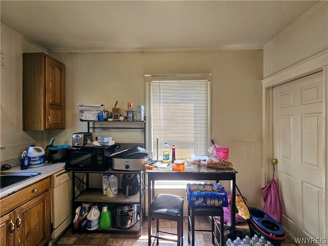 kitchen featuring white dishwasher and ornamental molding