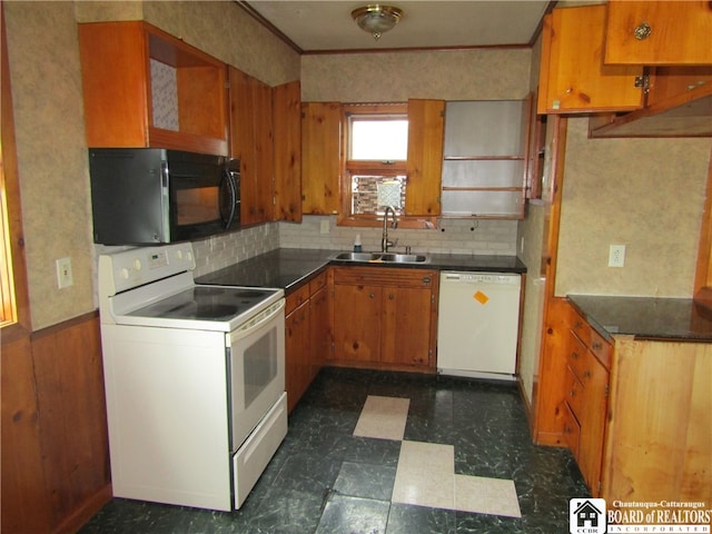 kitchen with ornamental molding, sink, white appliances, and decorative backsplash