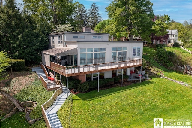 2 Elm Ln, Chautauqua, NY 14722 - rear view of house featuring stairway, a yard, and a deck