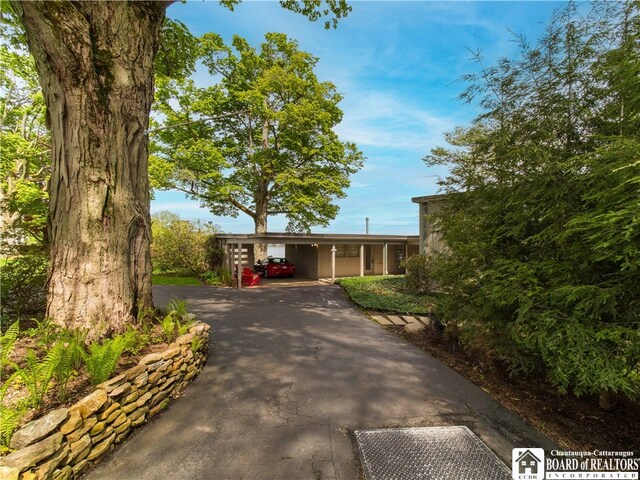 2 Elm Ln, Chautauqua, NY 14722 - view of front facade with a carport and driveway