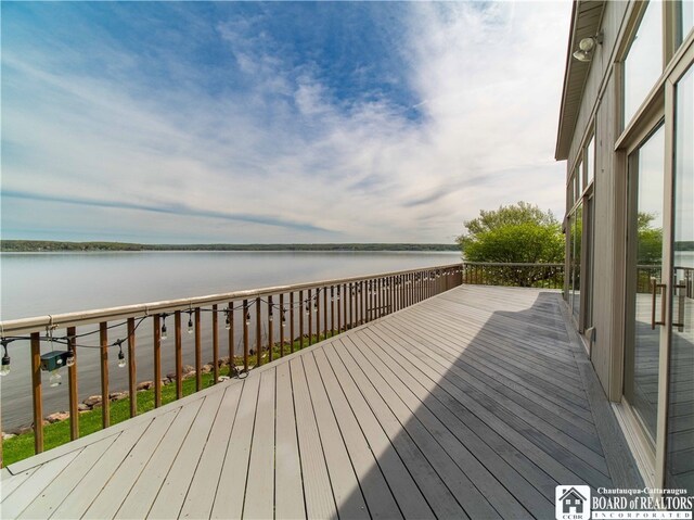 2 Elm Ln, Chautauqua, NY 14722 - wooden terrace with a water view