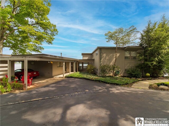 2 Elm Ln, Chautauqua, NY 14722 - mid-century modern home with a carport and driveway