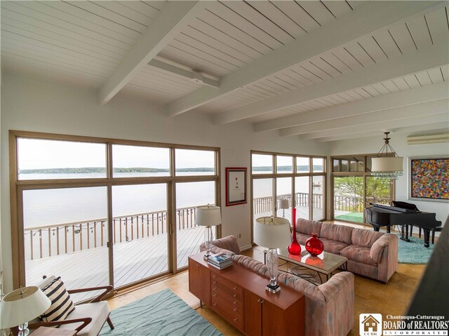 2 Elm Ln, Chautauqua, NY 14722 - living area featuring beamed ceiling, a water view, and light wood-type flooring