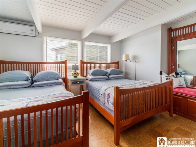 2 Elm Ln, Chautauqua, NY 14722 - carpeted bedroom featuring a wall mounted air conditioner and beam ceiling