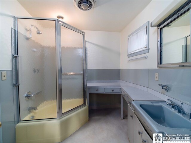 2 Elm Ln, Chautauqua, NY 14722 - full bathroom with visible vents, vanity, and bath / shower combo with glass door